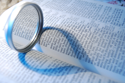 Ring on Bible with Heart-Shaped Shadow